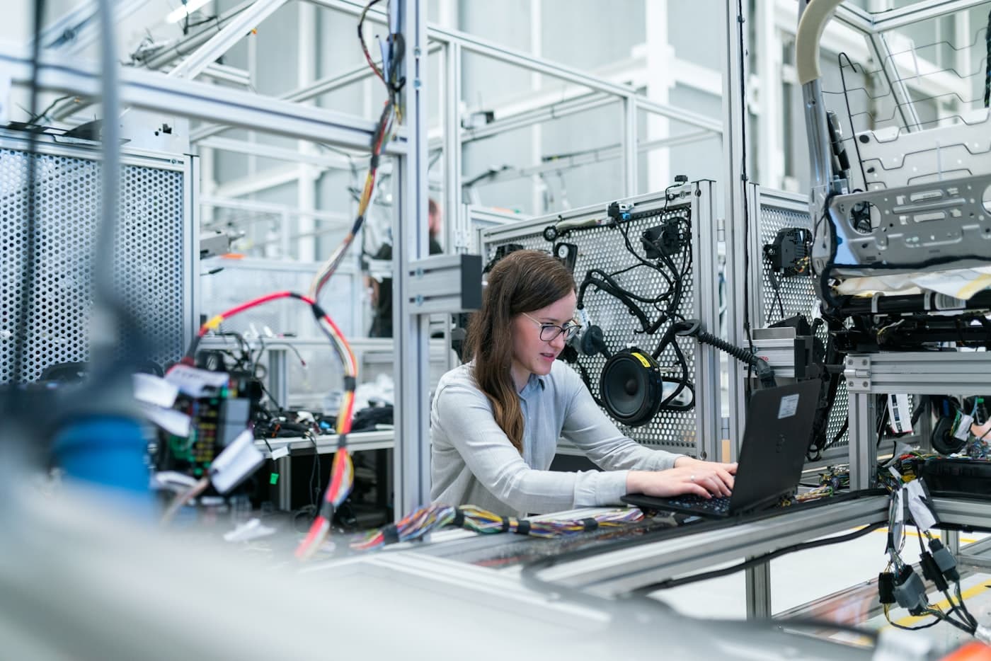 An engineer working on a manufacturing line